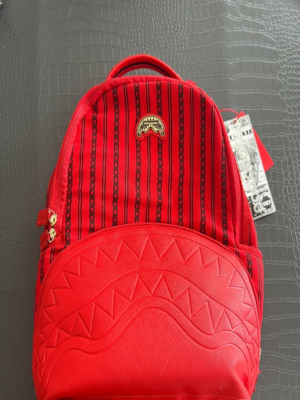 Limited edition spray ground knapsack